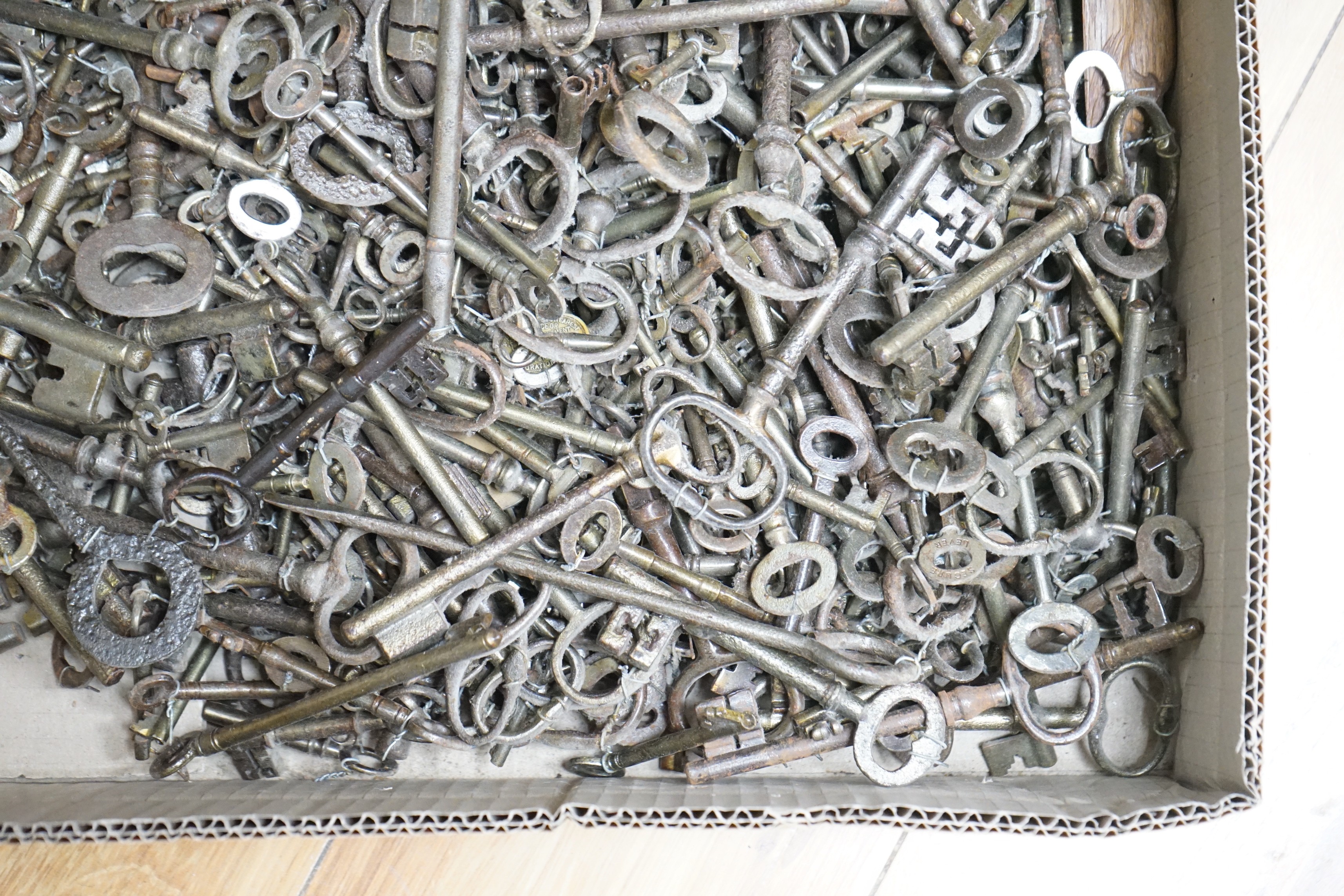 A large collection of antique keys